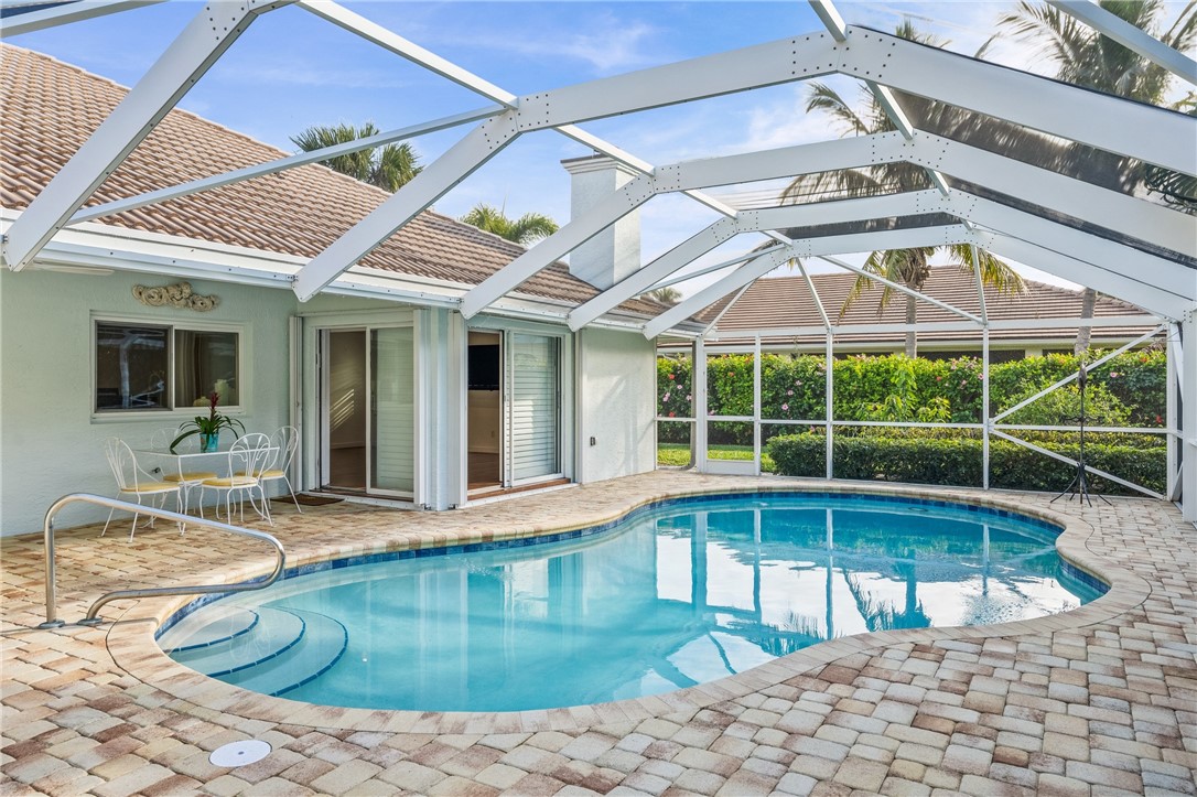 1939 Ocean Ridge Circle Vero Beach, FL 32963 - Photo 27 of 33 a view of a house with a swimming pool