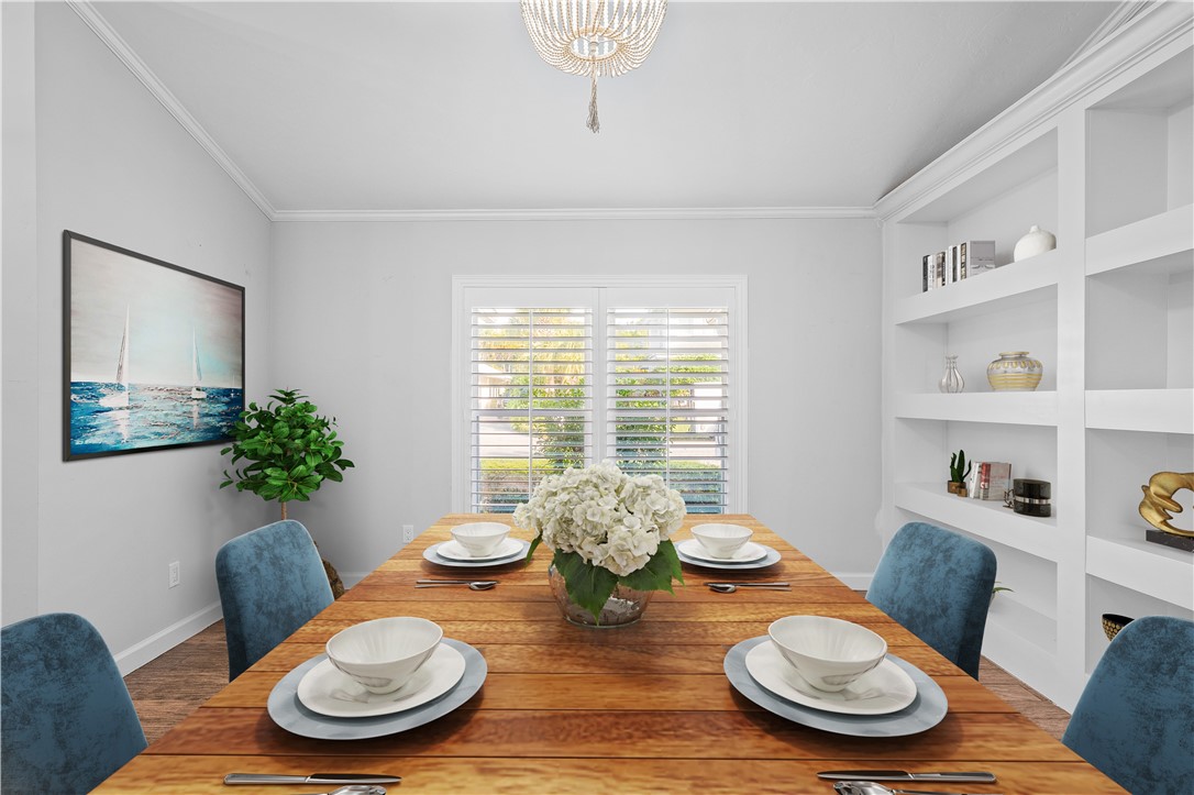 1939 Ocean Ridge Circle Vero Beach, FL 32963 - Photo 6 of 33 a table and chairs in a living room