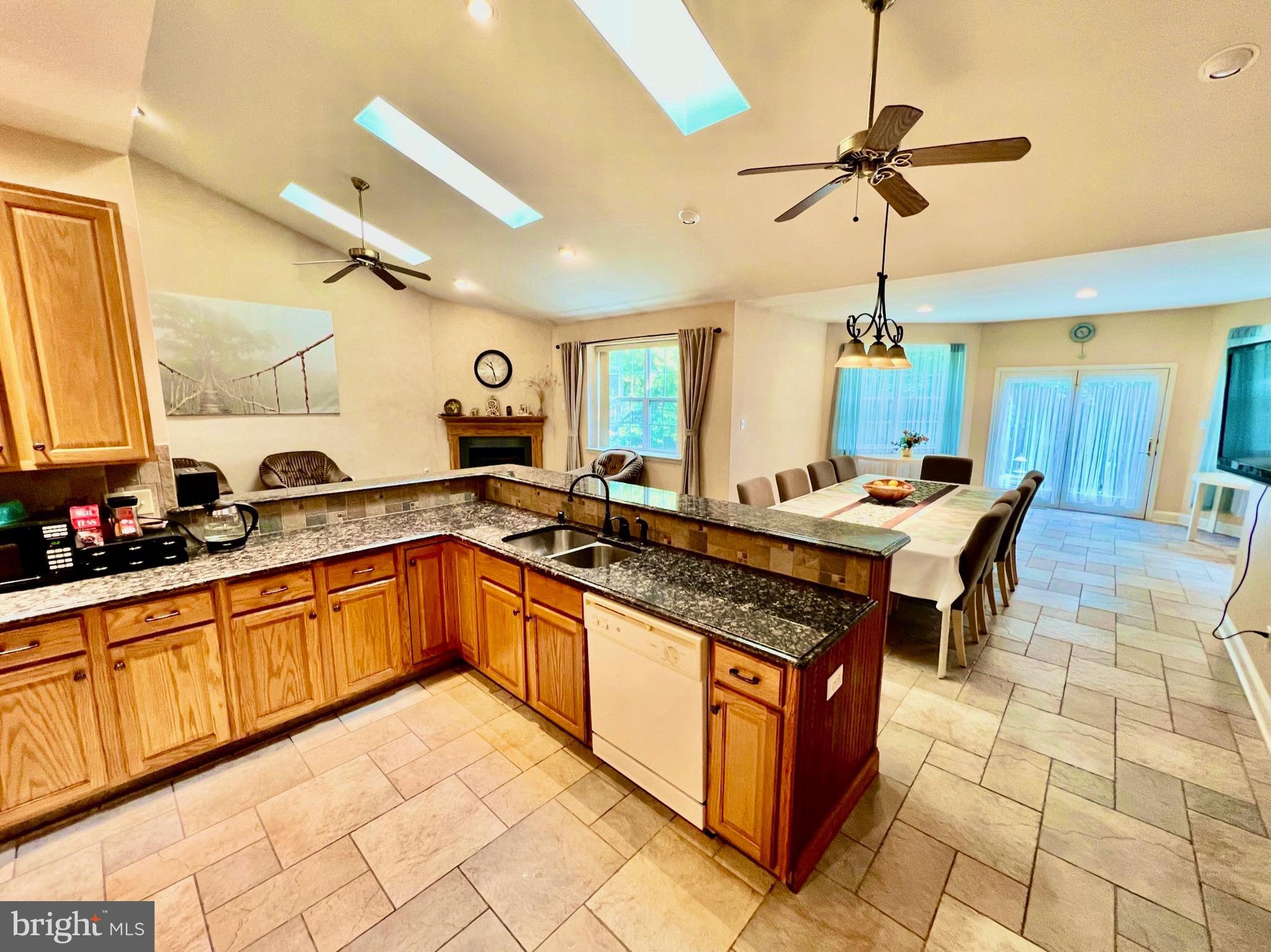 18 Skyline Circle Sewell, NJ 08080 - Photo 20 of 59 a kitchen with stainless steel appliances granite countertop a sink and a counter space