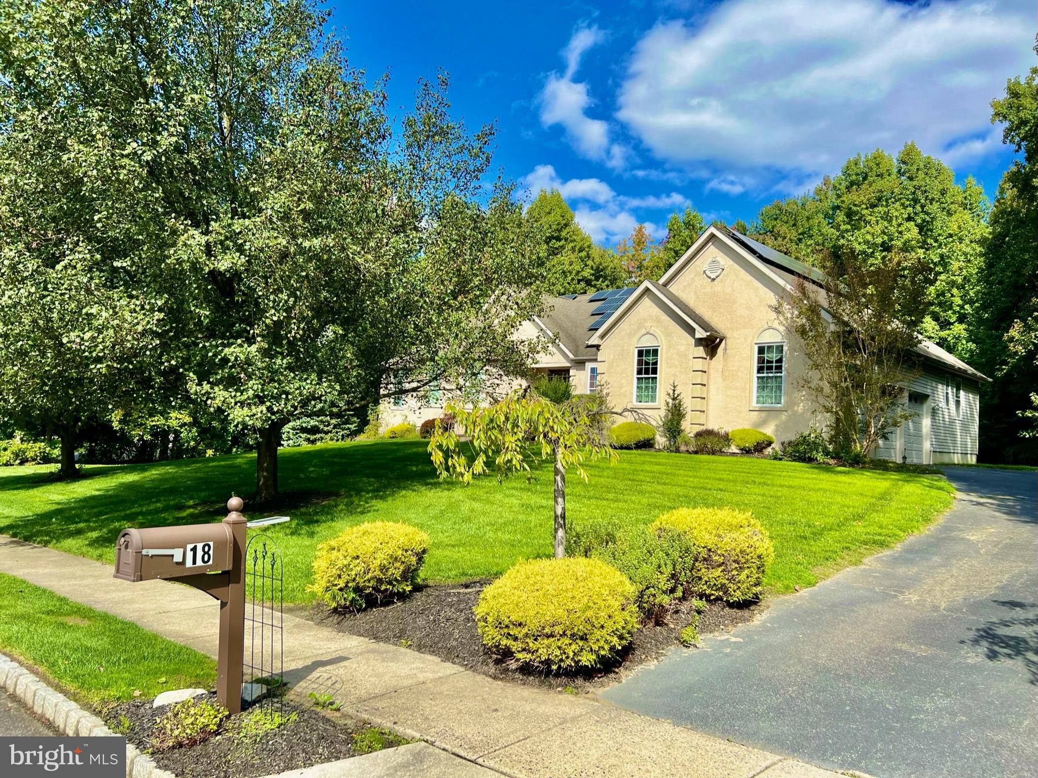 18 Skyline Circle Sewell, NJ 08080 - Photo 2 of 59 a front view of a house with garden