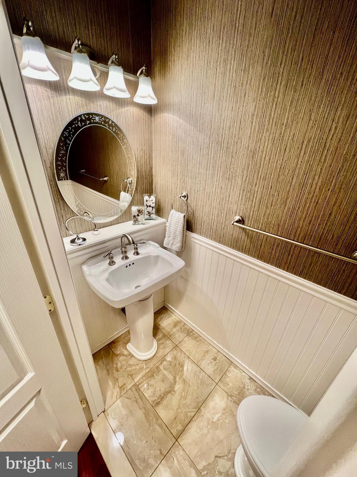 18 Skyline Circle Sewell, NJ 08080 - Photo 26 of 59 a bathroom with a sink a mirror and toilet