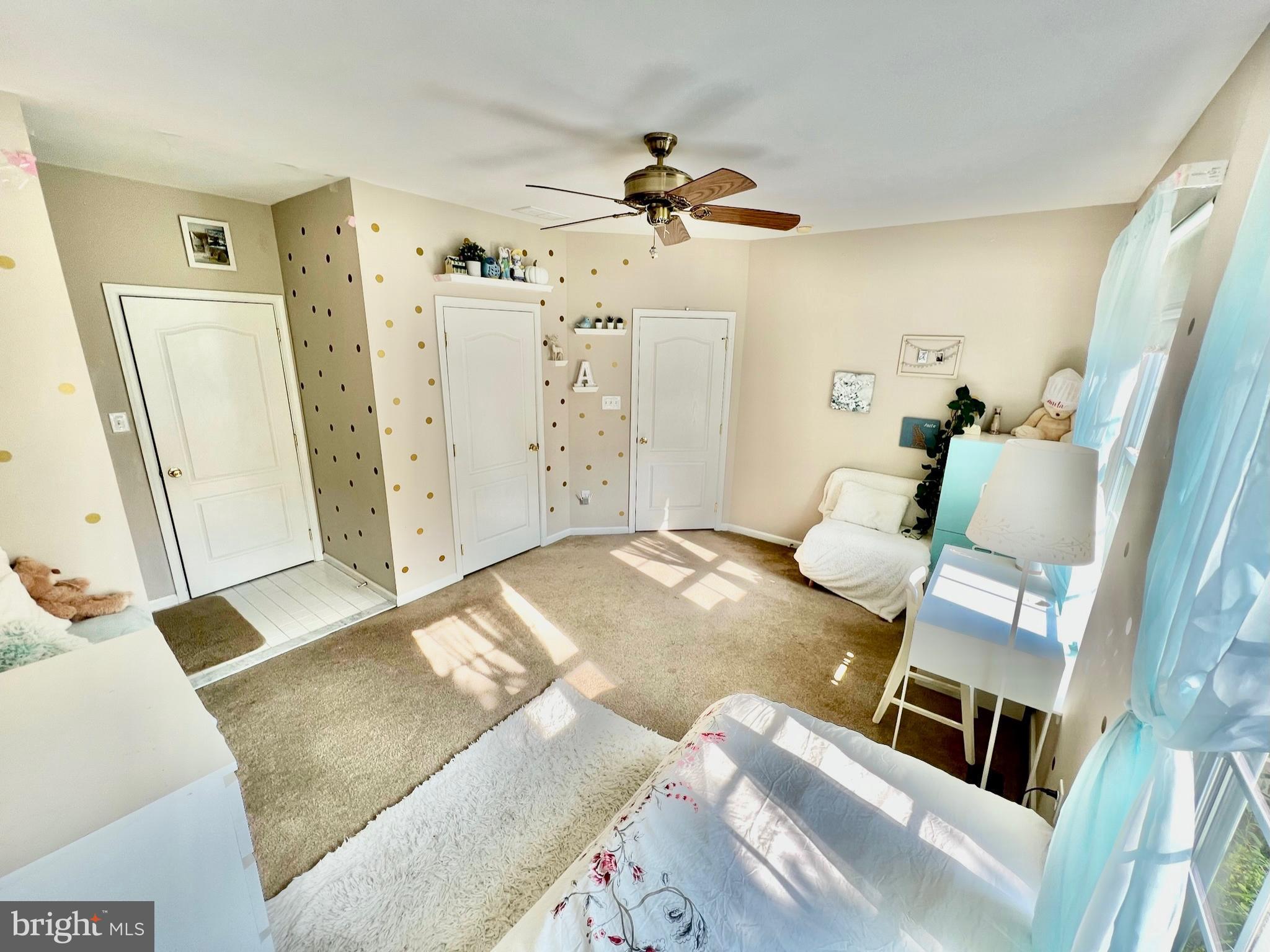 18 Skyline Circle Sewell, NJ 08080 - Photo 29 of 59 a bedroom with a bed and a mirror