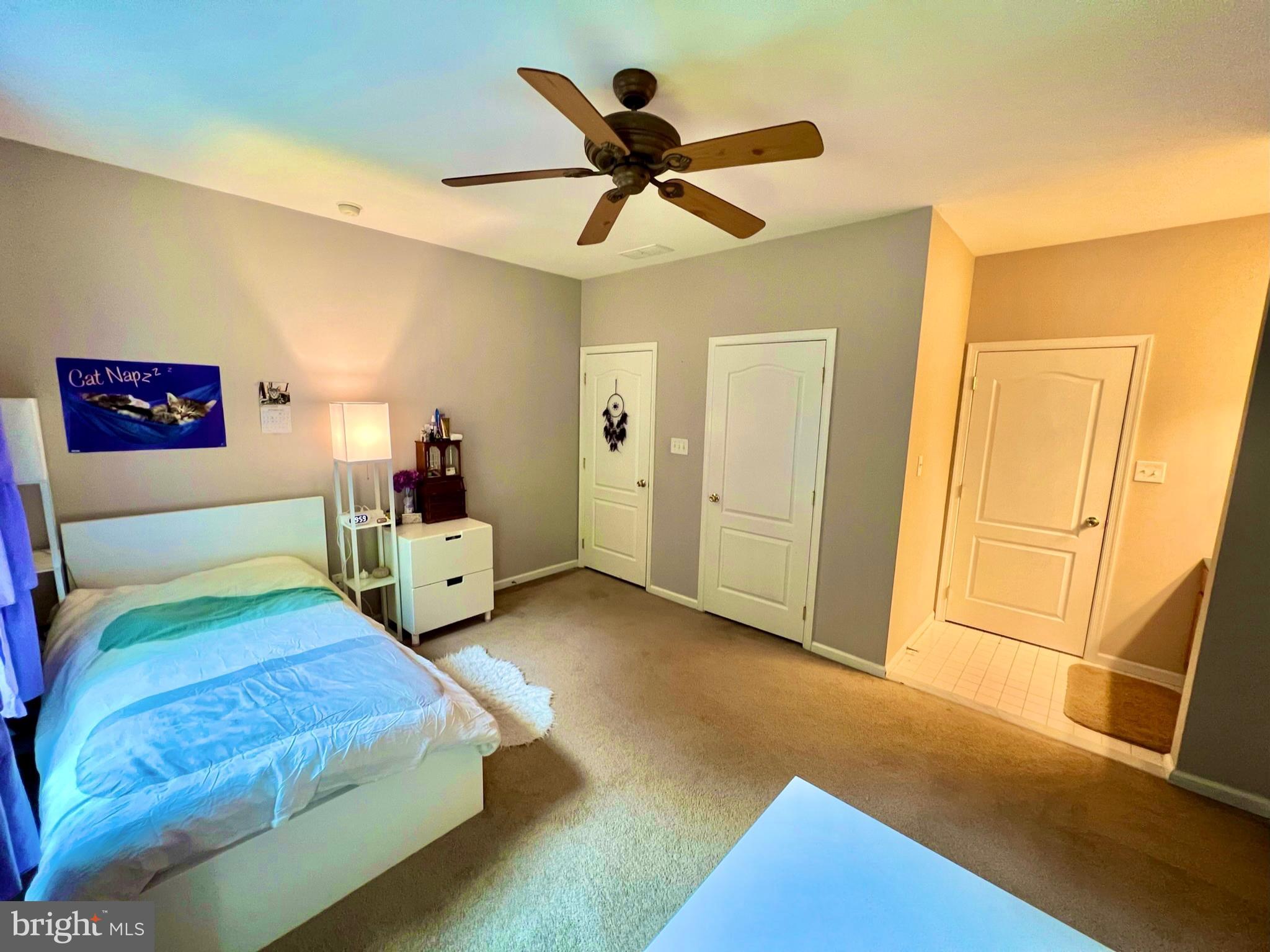 18 Skyline Circle Sewell, NJ 08080 - Photo 35 of 59 a bed room with a bed and a ceiling fan