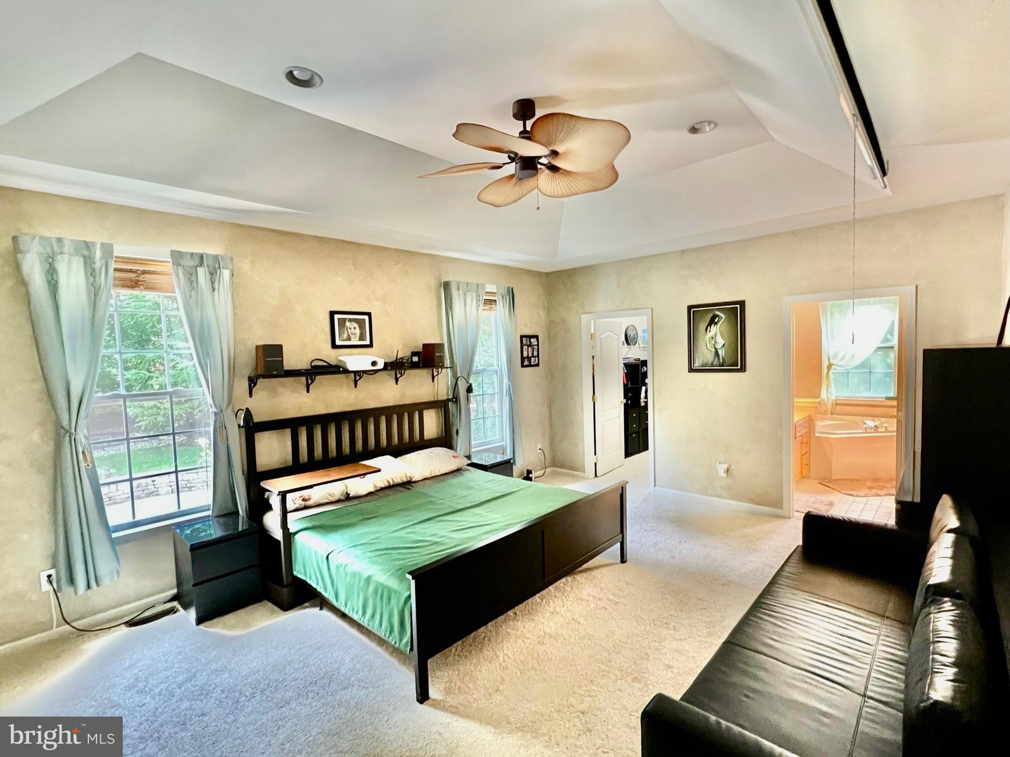 18 Skyline Circle Sewell, NJ 08080 - Photo 36 of 59 a living room with furniture a flat screen tv and a window