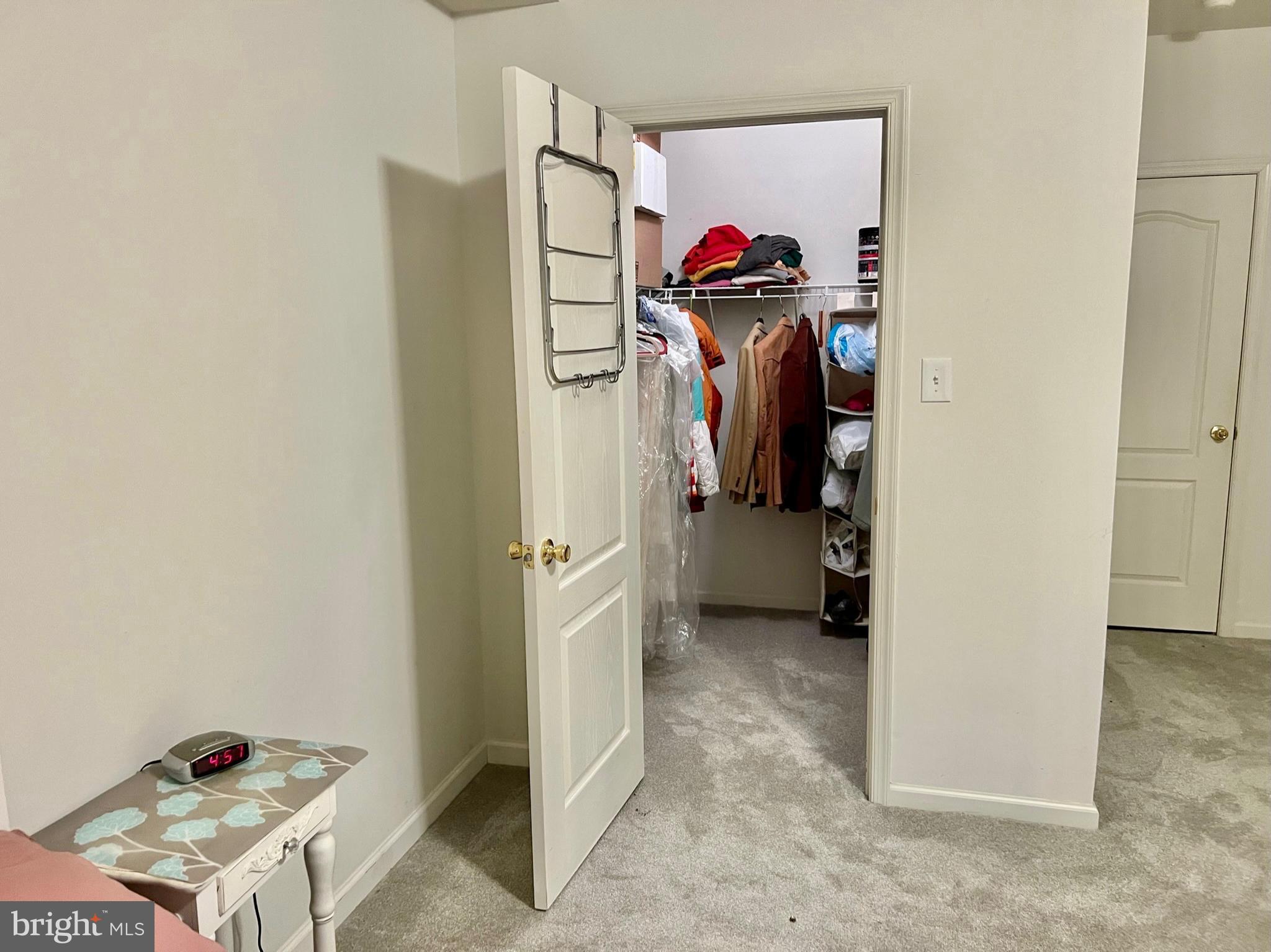 18 Skyline Circle Sewell, NJ 08080 - Photo 47 of 59 a view of walk in closet with clothes and shoes