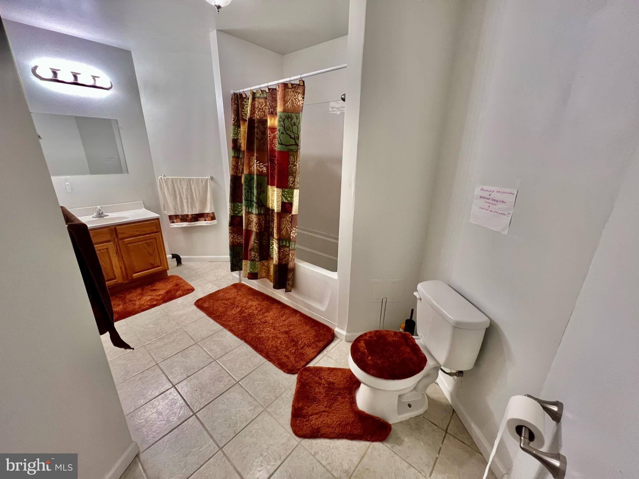 18 Skyline Circle Sewell, NJ 08080 - Photo 48 of 59 a bathroom with a toilet and a mirror