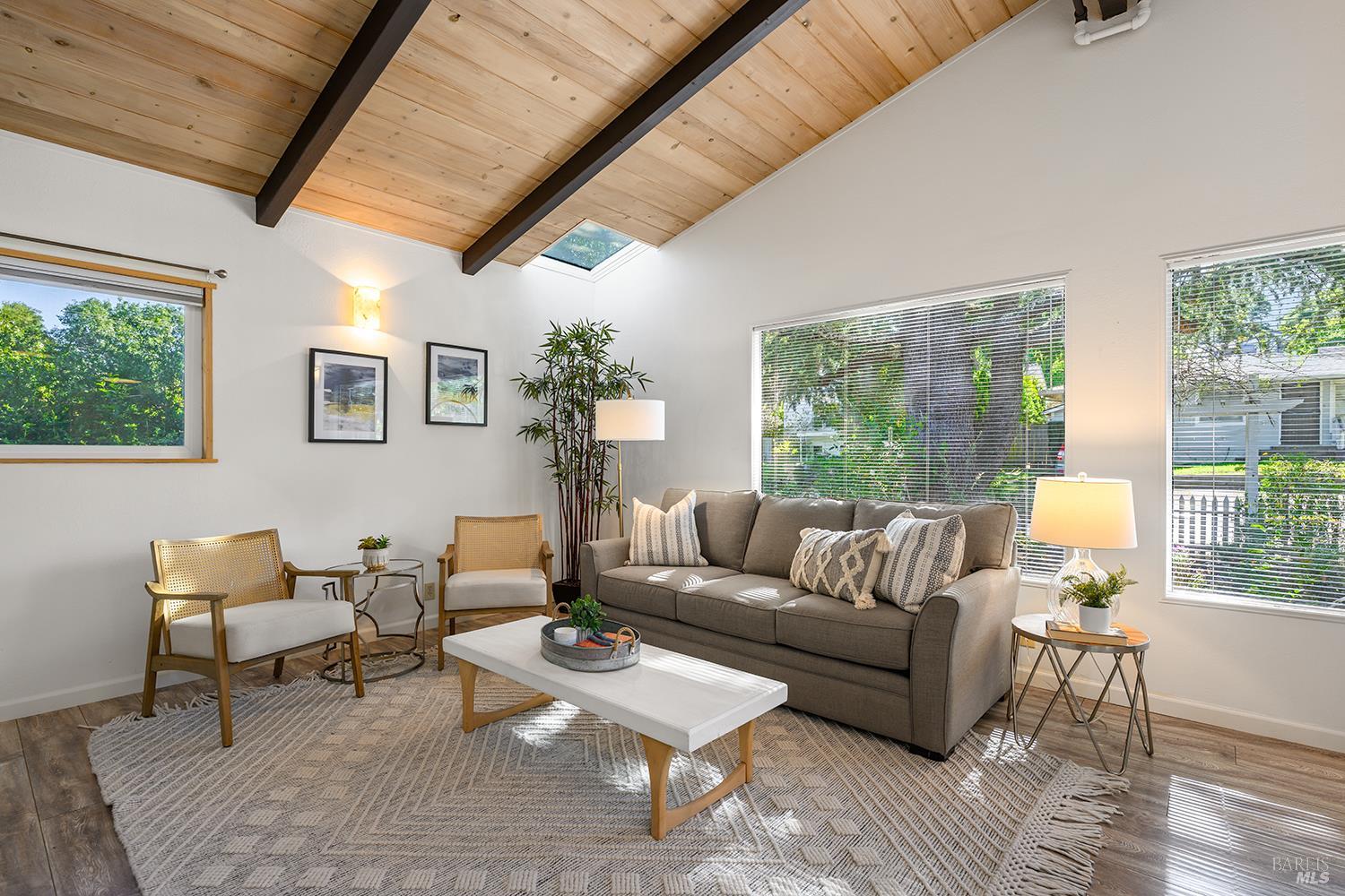 285 Neva Street Sebastopol, CA 95472 - Photo 12 of 39 a living room with furniture and a large window