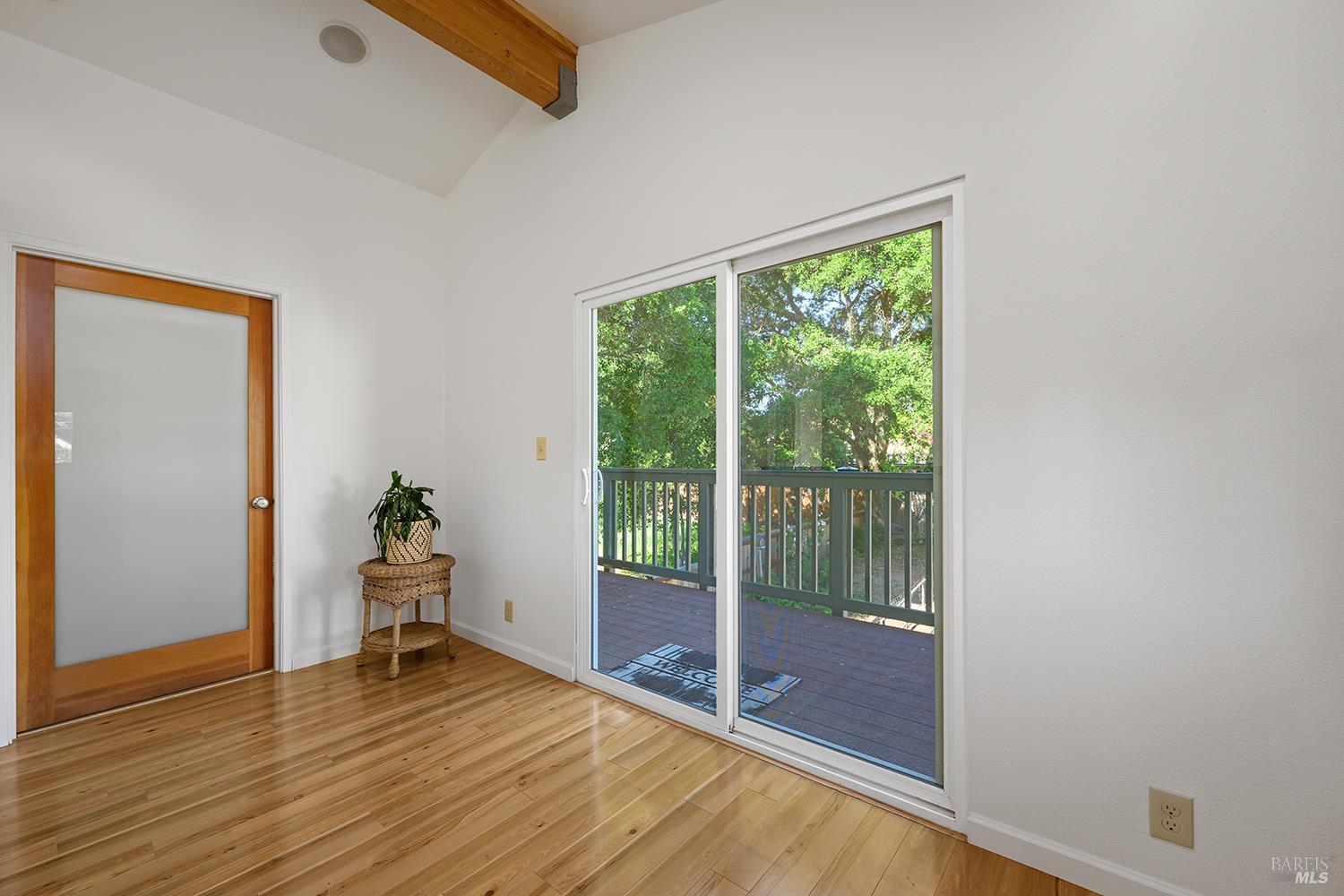285 Neva Street Sebastopol, CA 95472 - Photo 23 of 39 a view of an empty room with wooden floor and a window