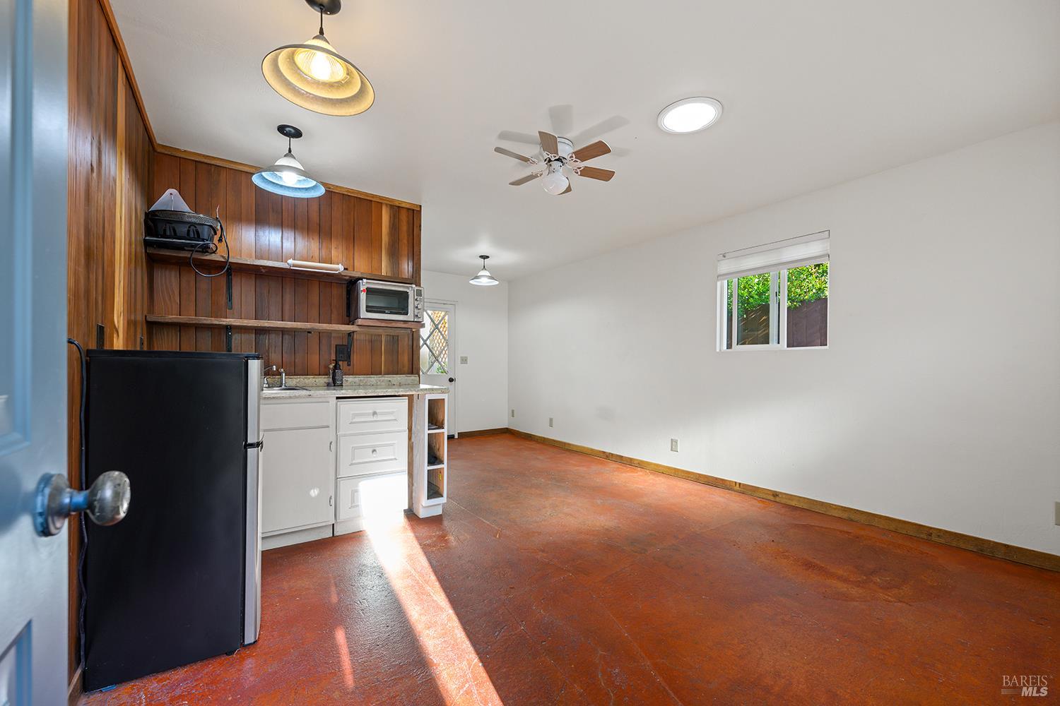 285 Neva Street Sebastopol, CA 95472 - Photo 30 of 39 wooden floor in an empty room with a window