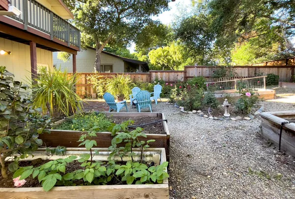 a backyard of a house with lots of green space