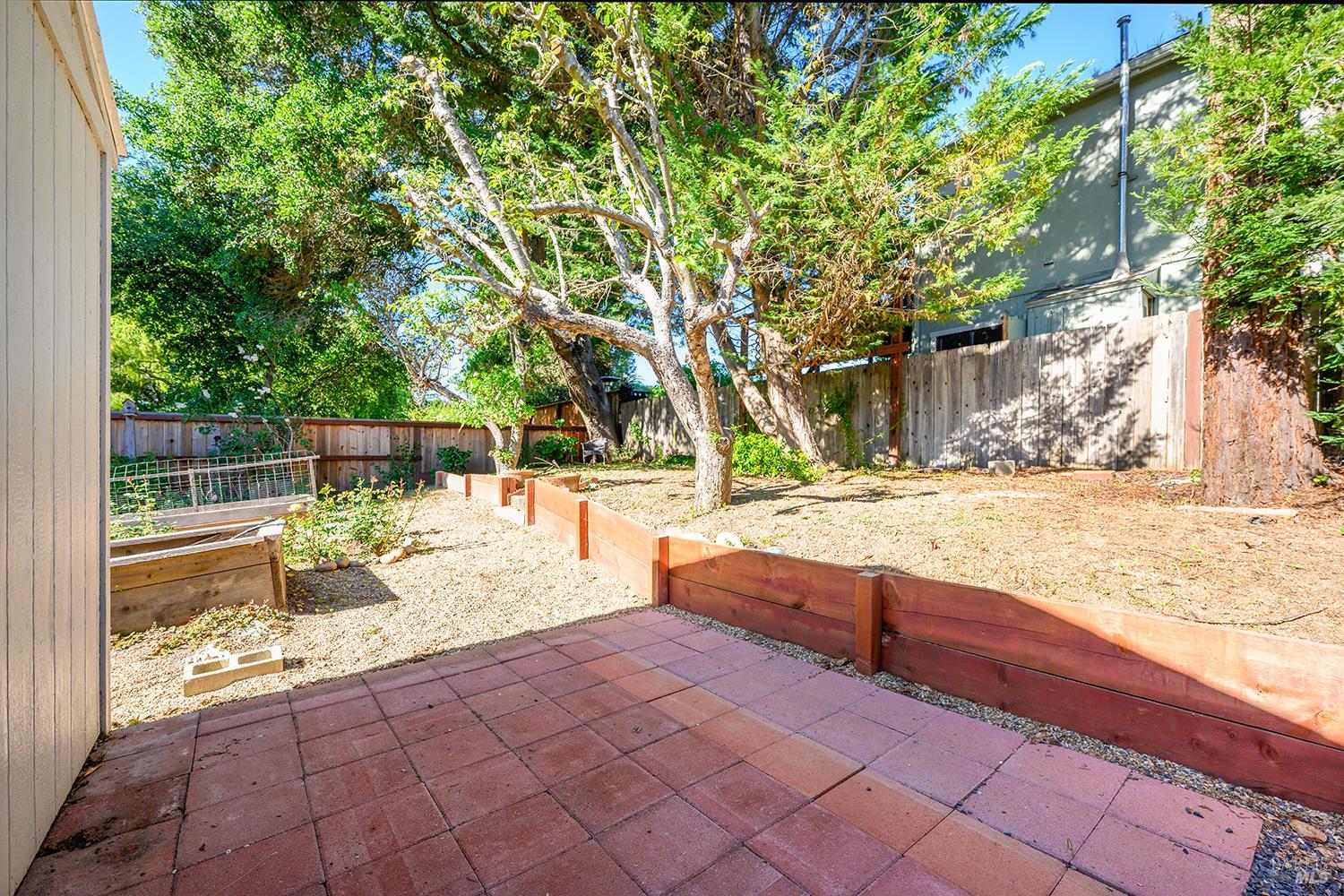285 Neva Street Sebastopol, CA 95472 - Photo 37 of 39 a view of a yard with wooden fence
