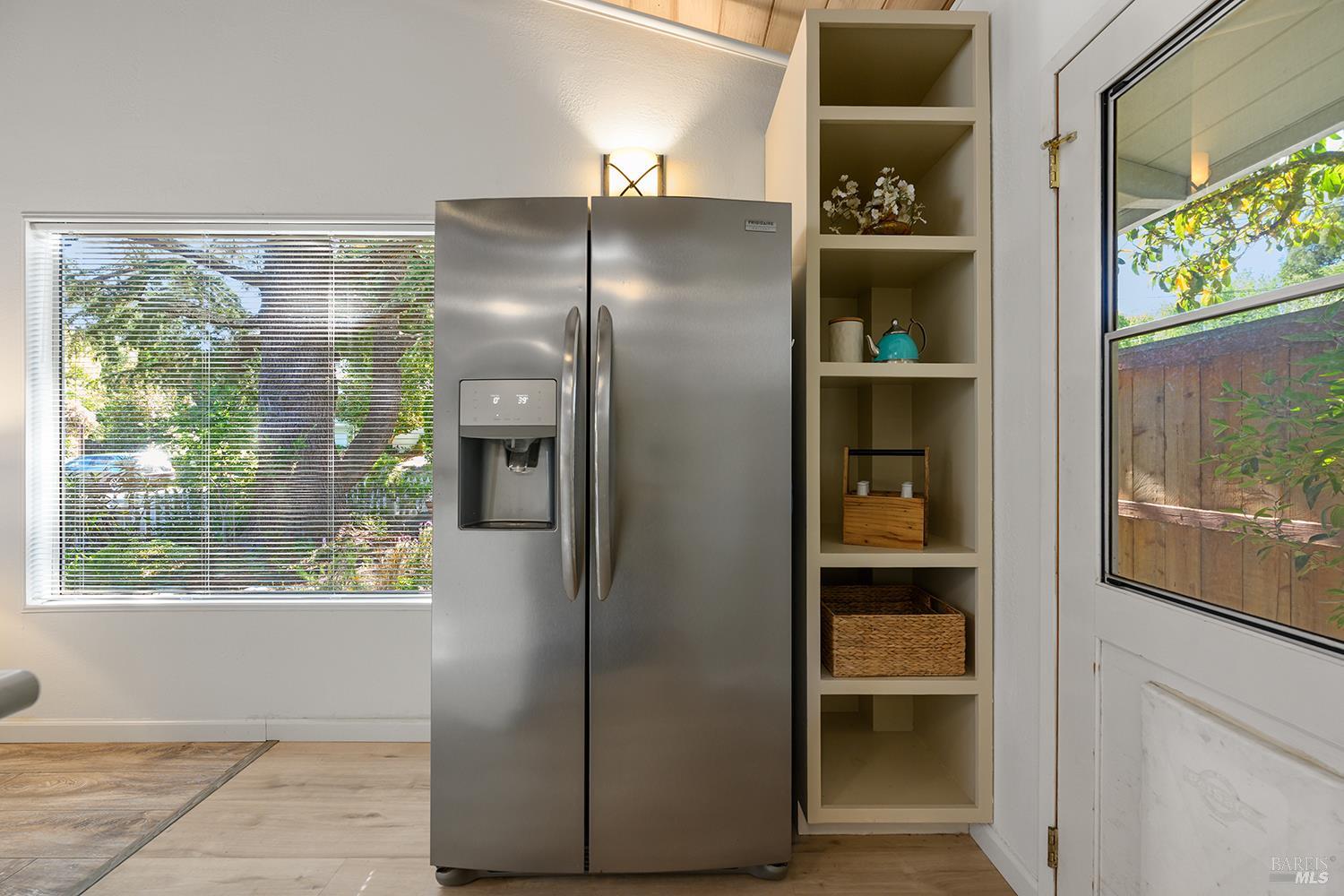 285 Neva Street Sebastopol, CA 95472 - Photo 10 of 39 a kitchen with a refrigerator and a window