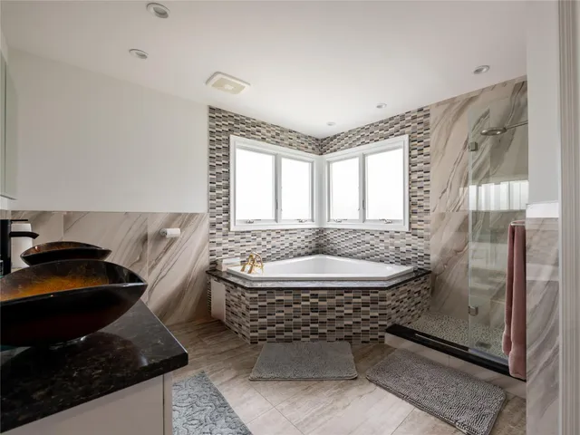 a living room with a rug and a table