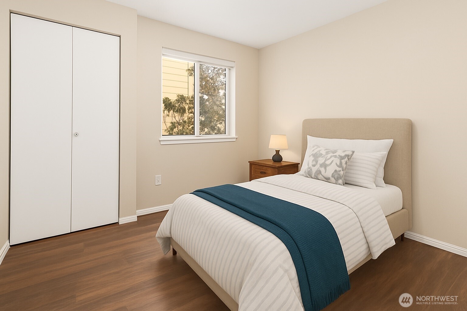 3350 Northwest Avenue, Unit 102 Bellingham, WA 98225 - Photo 22 of 28 a bedroom with a bed and a window