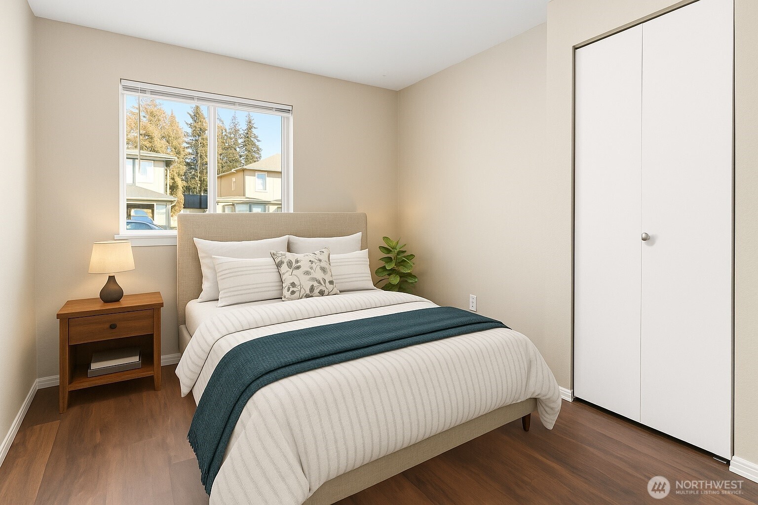 3350 Northwest Avenue, Unit 102 Bellingham, WA 98225 - Photo 26 of 28 a bedroom with a bed and a window