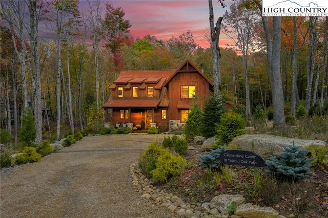 a view of a street with a building in the background