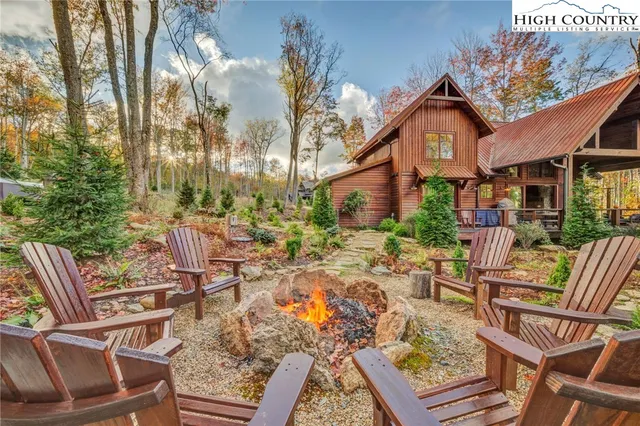 a view of a patio with chairs and tables