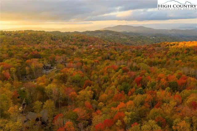 a view of a city with mountains in the background