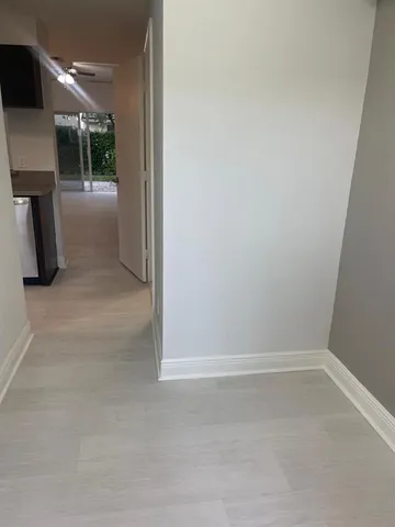 a view of a room with rack on the wall