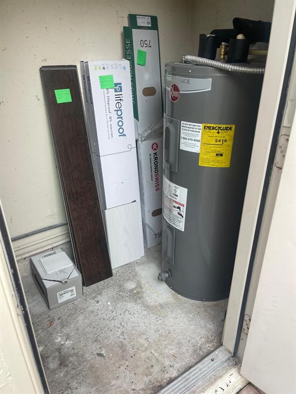 9967 Northwest 56th Place, Unit 9967 Coral Springs, FL 33076 - Photo 18 of 38 a view of water heater room