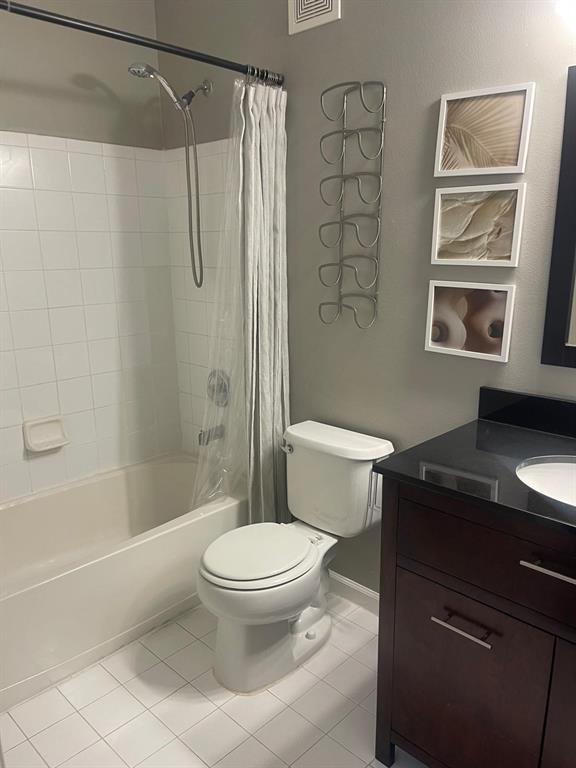 9967 Northwest 56th Place, Unit 9967 Coral Springs, FL 33076 - Photo 21 of 38 a bathroom with a sink a toilet and shower