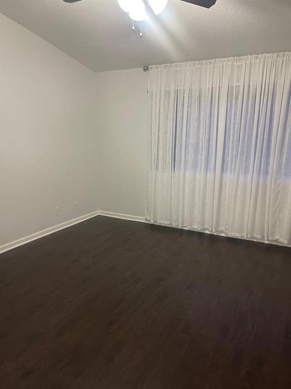 9967 Northwest 56th Place, Unit 9967 Coral Springs, FL 33076 - Photo 26 of 38 an empty room with a window