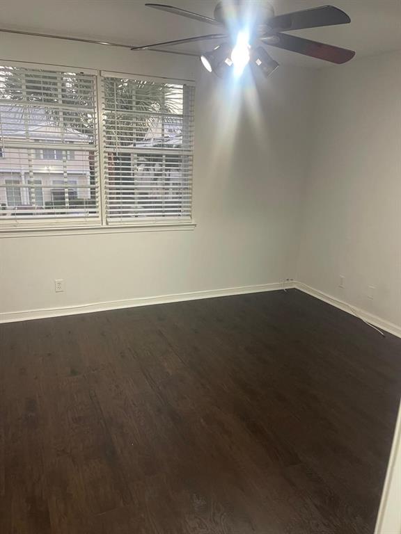 9967 Northwest 56th Place, Unit 9967 Coral Springs, FL 33076 - Photo 36 of 38 a view of wooden floor and windows in a room