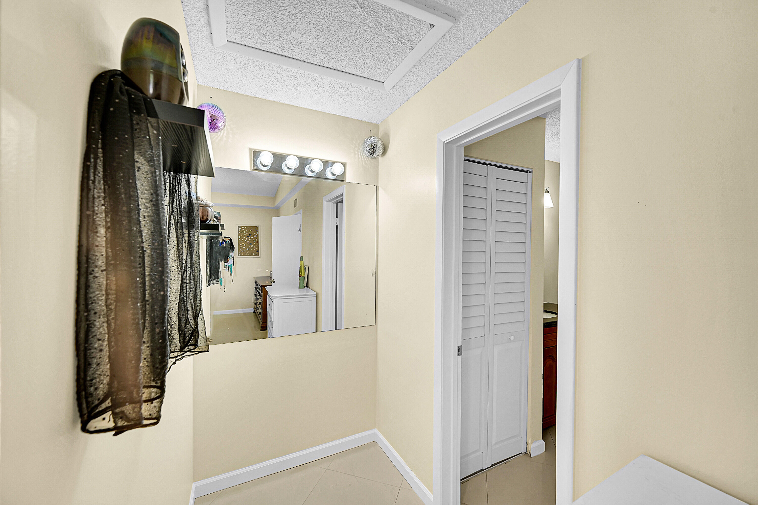 931 Lyons Road, Unit 4201 Coconut Creek, FL 33063 - Photo 13 of 47 a view of walk in closet