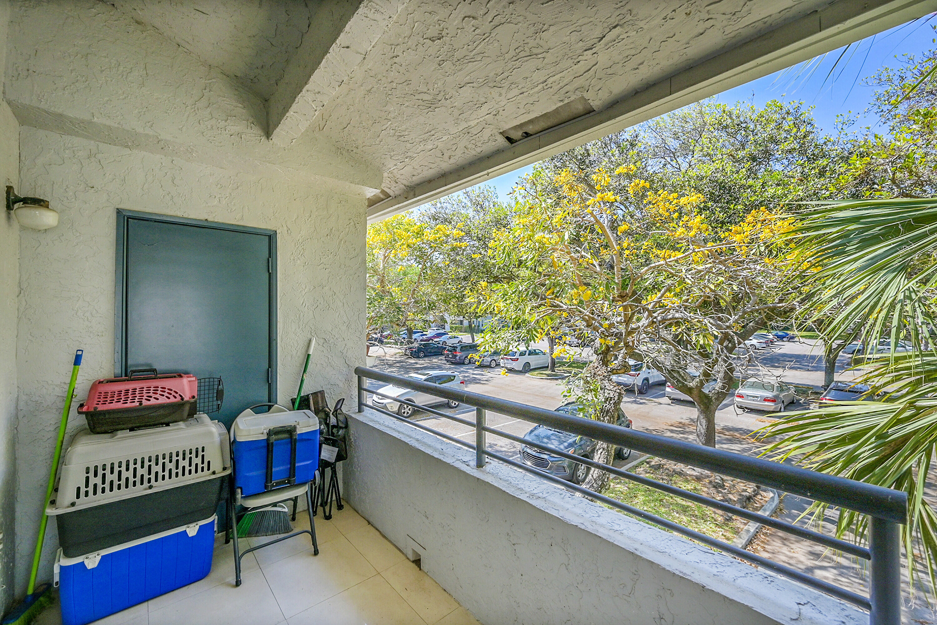 931 Lyons Road, Unit 4201 Coconut Creek, FL 33063 - Photo 7 of 47 a kitchen with a table and chairs