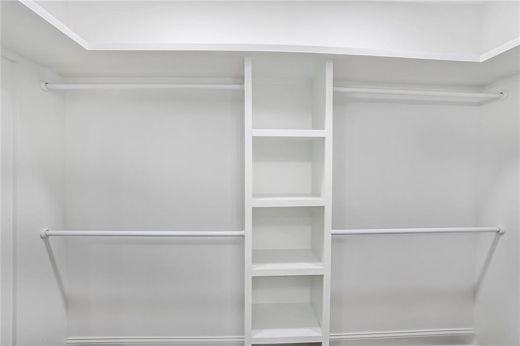 1321 Avon Avenue Southwest Atlanta, GA 30310 - Photo 11 of 20 a view of walk in closet with empty racks