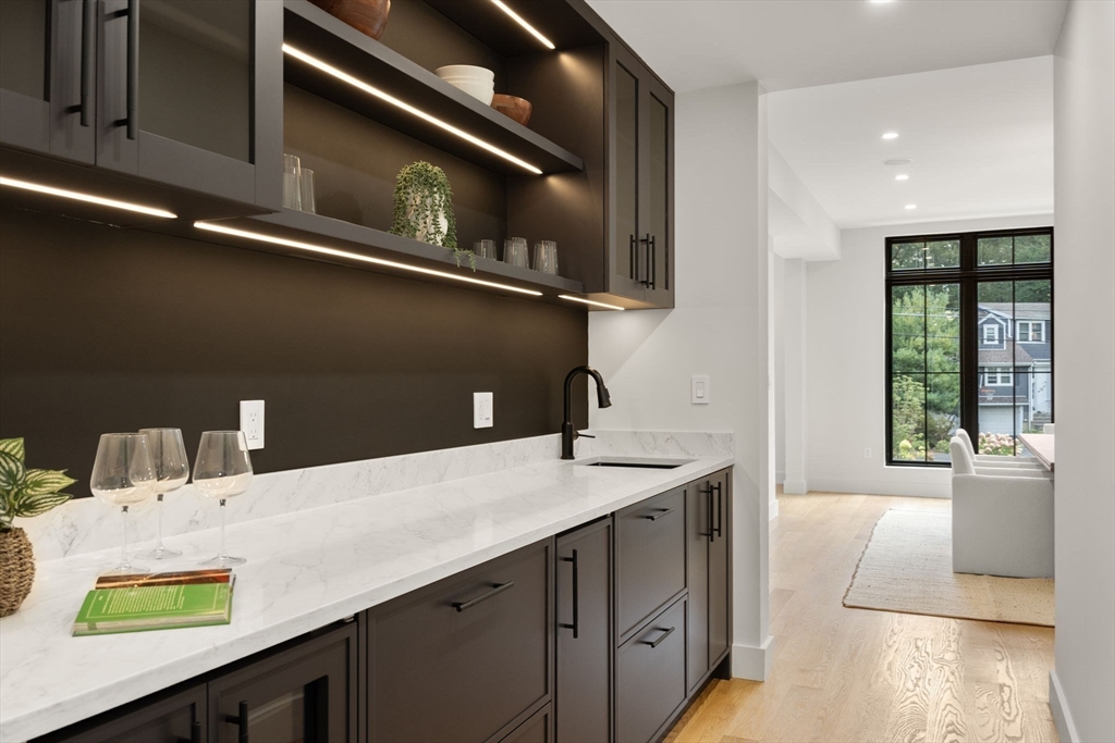 68 Locust Lane Needham, MA 02492 - Photo 11 of 39 a bathroom with a sink and a mirror