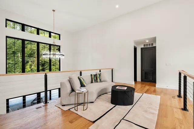 a view of an empty room with glass door