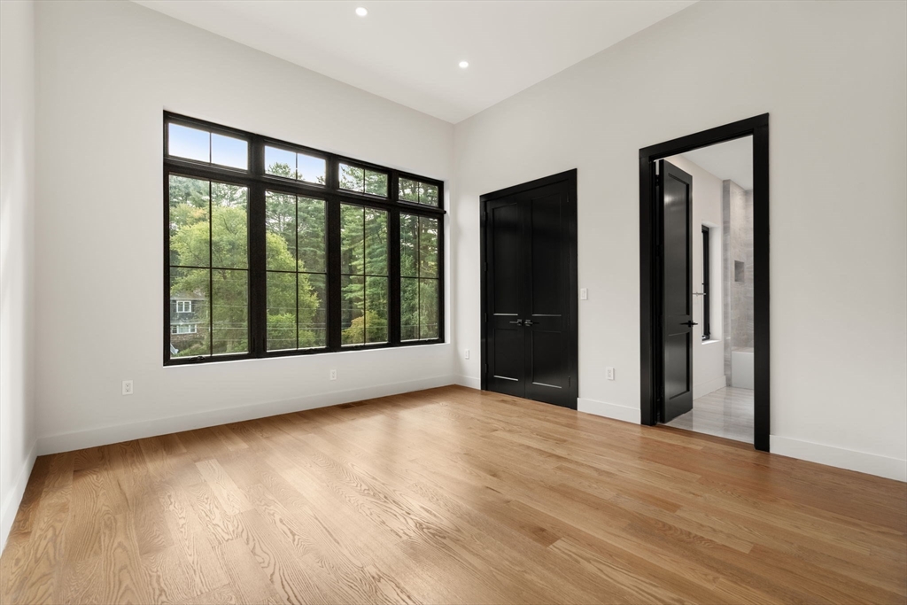 68 Locust Lane Needham, MA 02492 - Photo 25 of 39 a view of an empty room with glass door