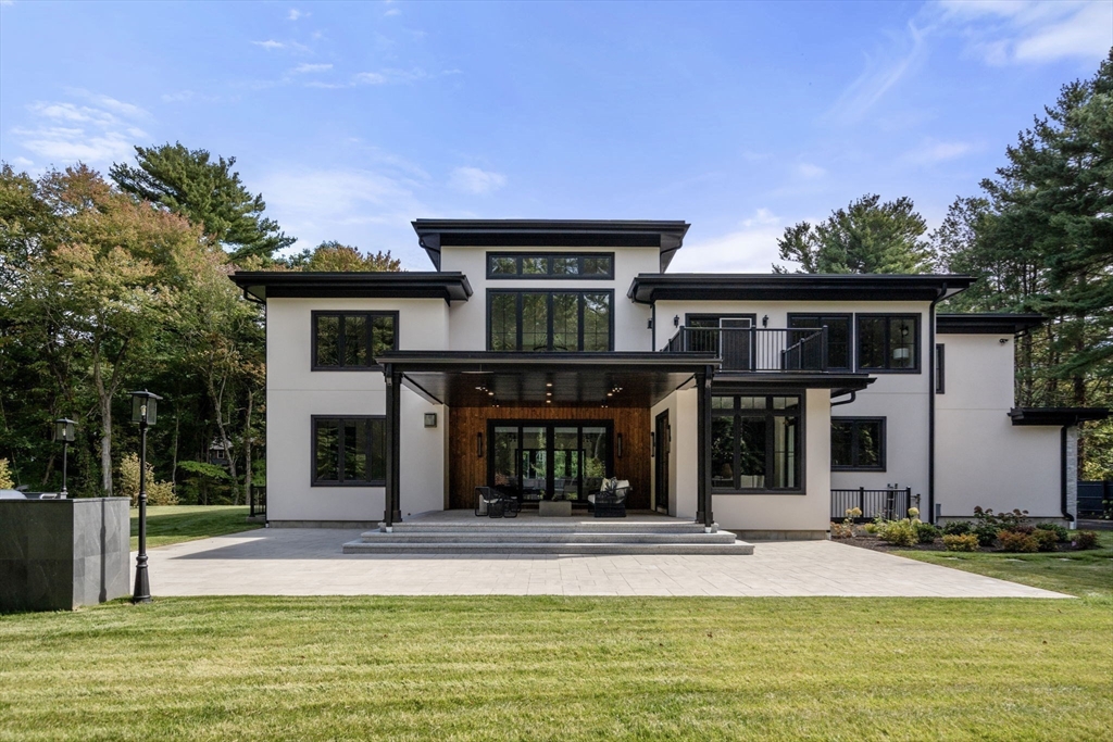 68 Locust Lane Needham, MA 02492 - Photo 33 of 39 a view of a house with a swimming pool