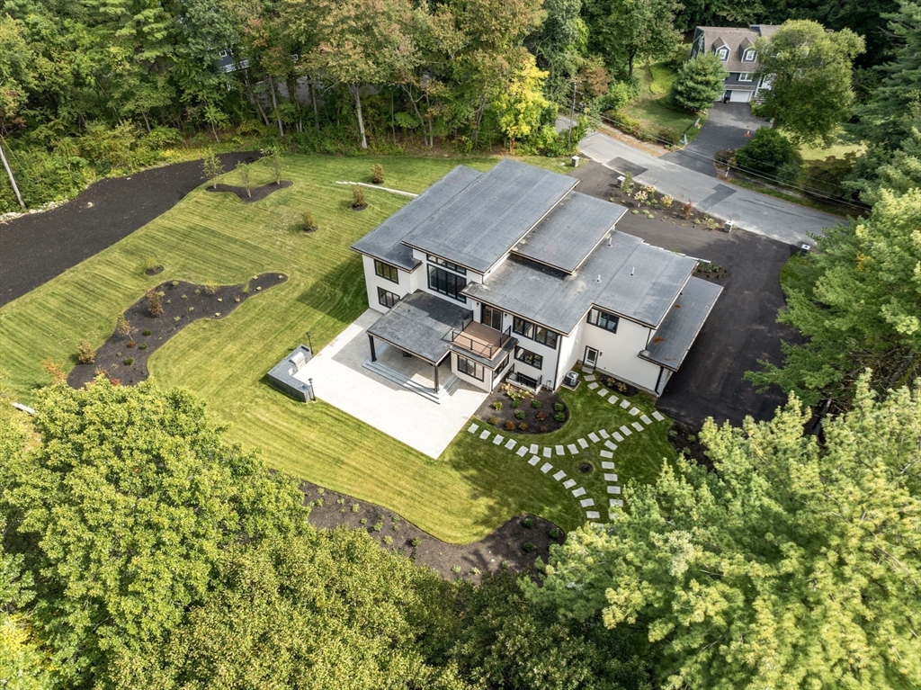 68 Locust Lane Needham, MA 02492 - Photo 38 of 39 an aerial view of a house with pool outdoor seating yard and green space