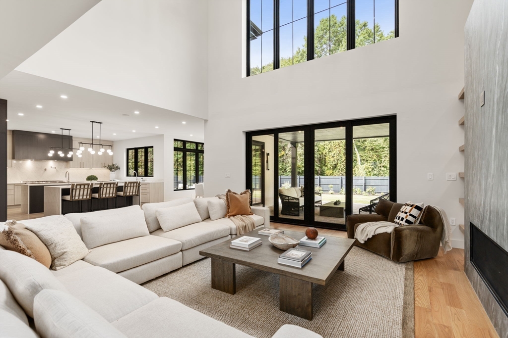 68 Locust Lane Needham, MA 02492 - Photo 4 of 39 a living room with furniture and floor to ceiling windows