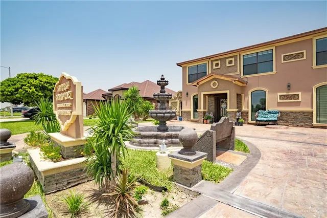 a front view of house with yard outdoor seating and entertaining space