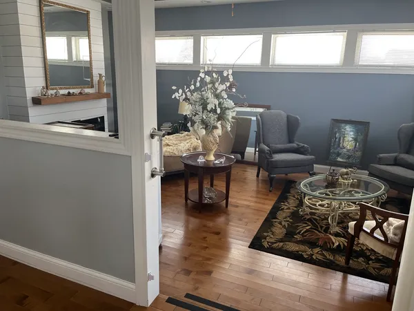 a living room with furniture and a table