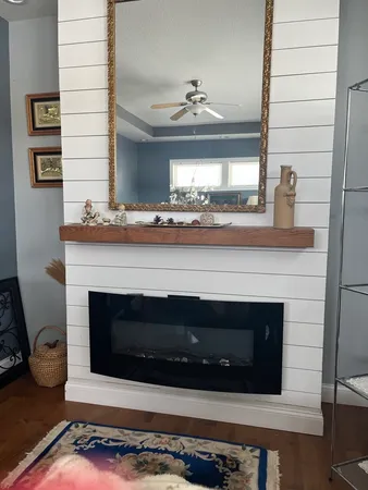 a stove top oven sitting inside of a kitchen