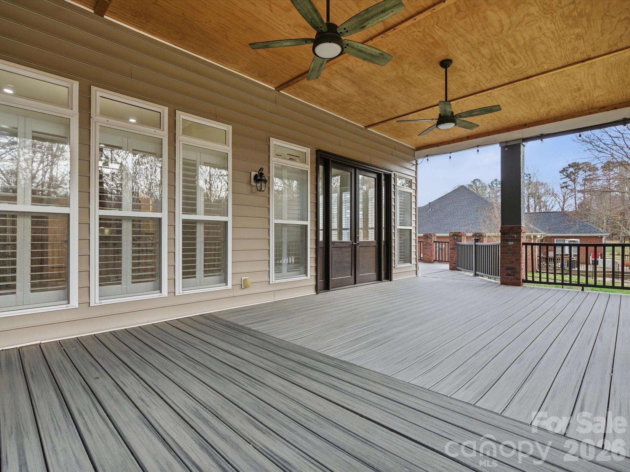 117 Abernathy Road Stanley, NC 28164 - Photo 11 of 47 a outdoor space with wooden floor and windows