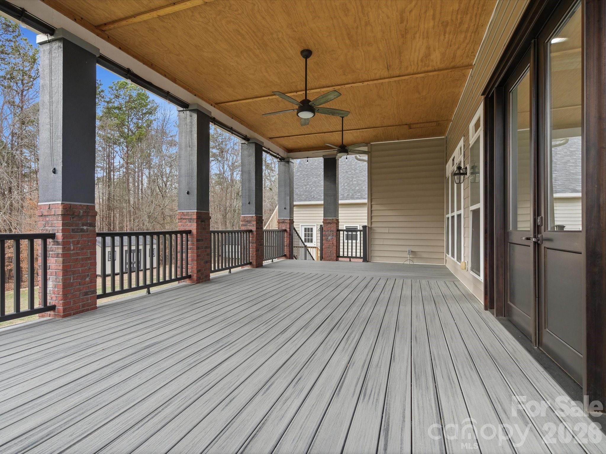 117 Abernathy Road Stanley, NC 28164 - Photo 13 of 47 a view of a balcony with wooden floor