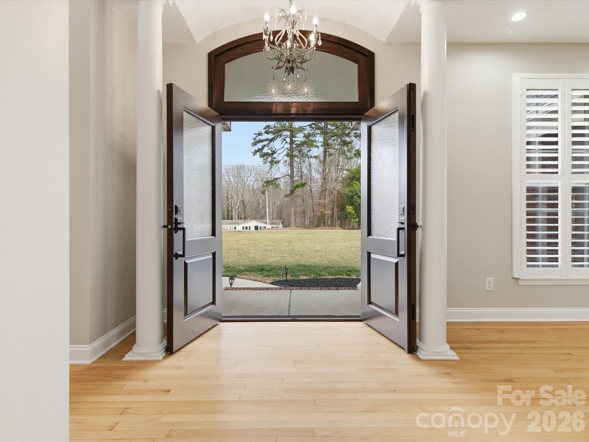 117 Abernathy Road Stanley, NC 28164 - Photo 16 of 47 a view of a room that has a large window and front door