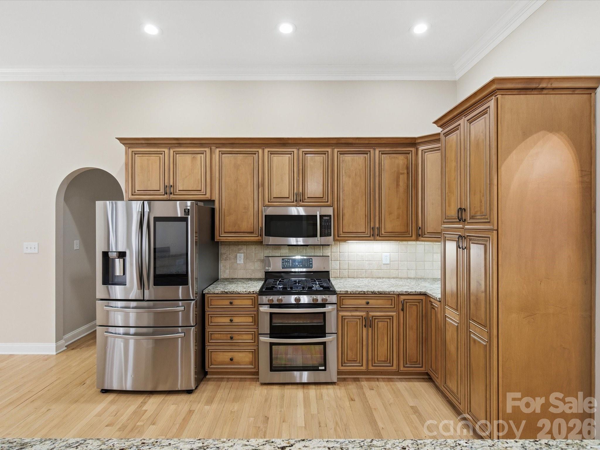 117 Abernathy Road Stanley, NC 28164 - Photo 26 of 47 a kitchen with a refrigerator stove and microwave