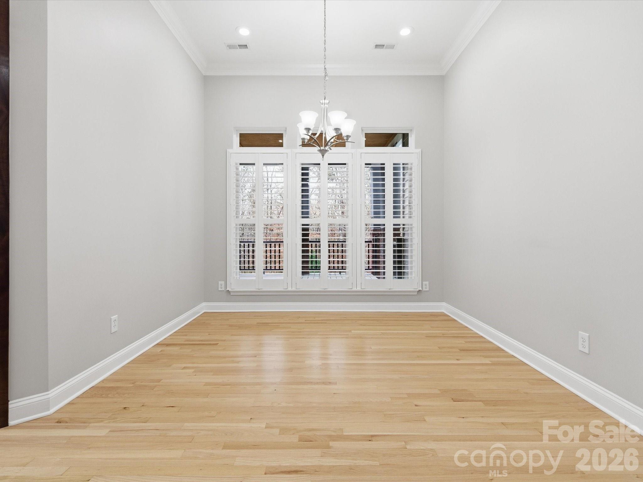 117 Abernathy Road Stanley, NC 28164 - Photo 28 of 47 a view of wooden floor and windows in a room