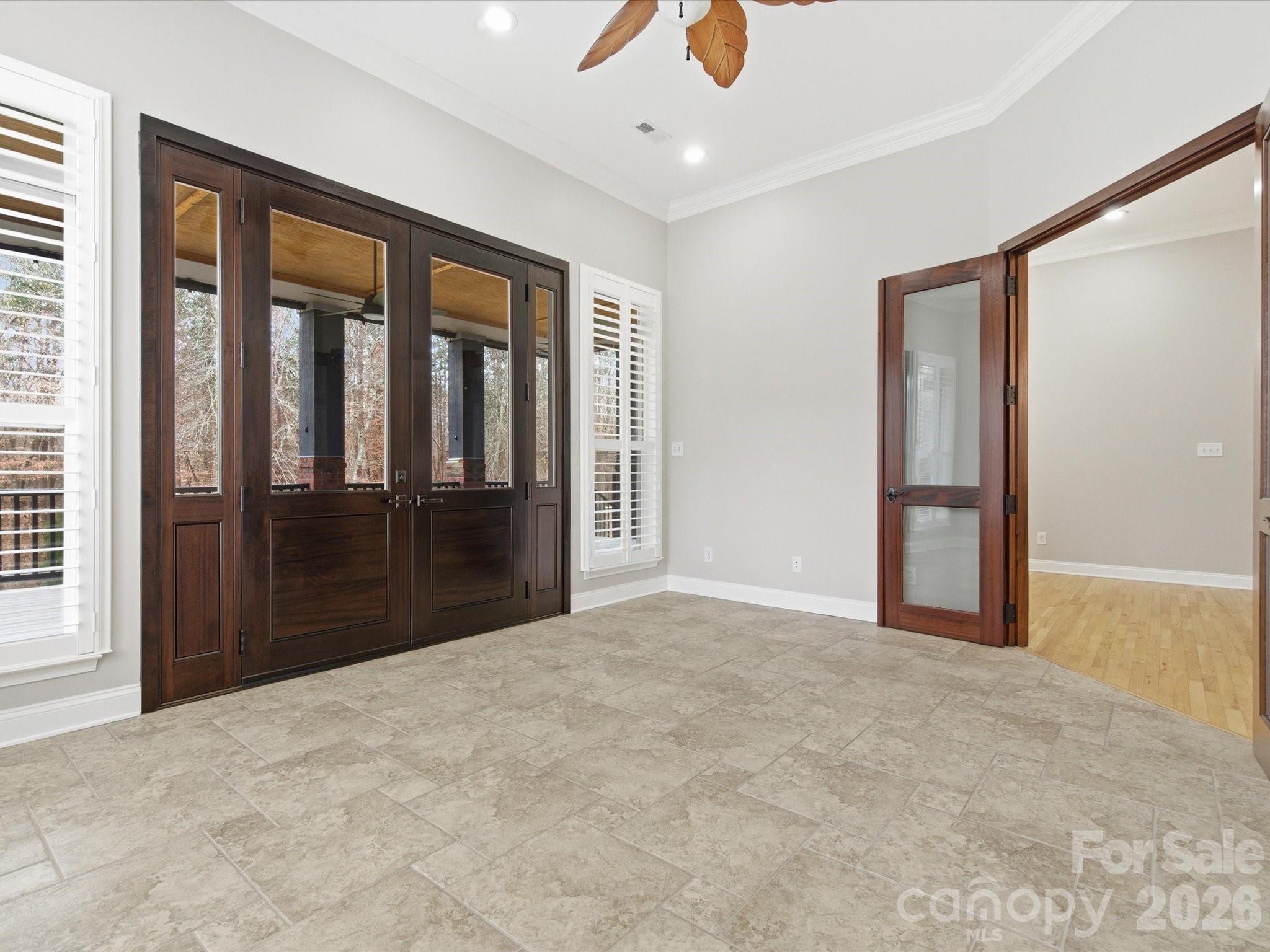 117 Abernathy Road Stanley, NC 28164 - Photo 32 of 47 an empty room with windows and closet