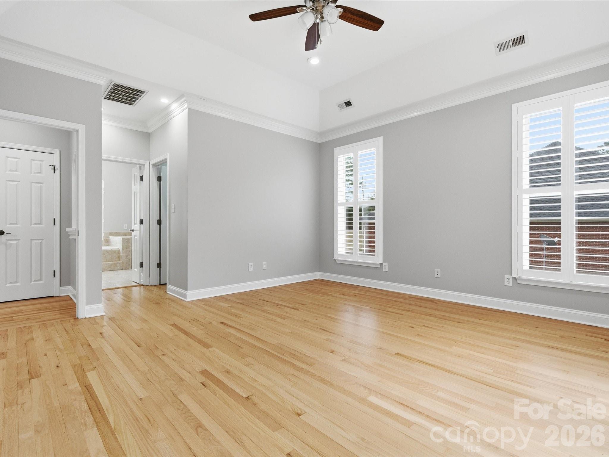 117 Abernathy Road Stanley, NC 28164 - Photo 35 of 47 wooden floor in an empty room with a window