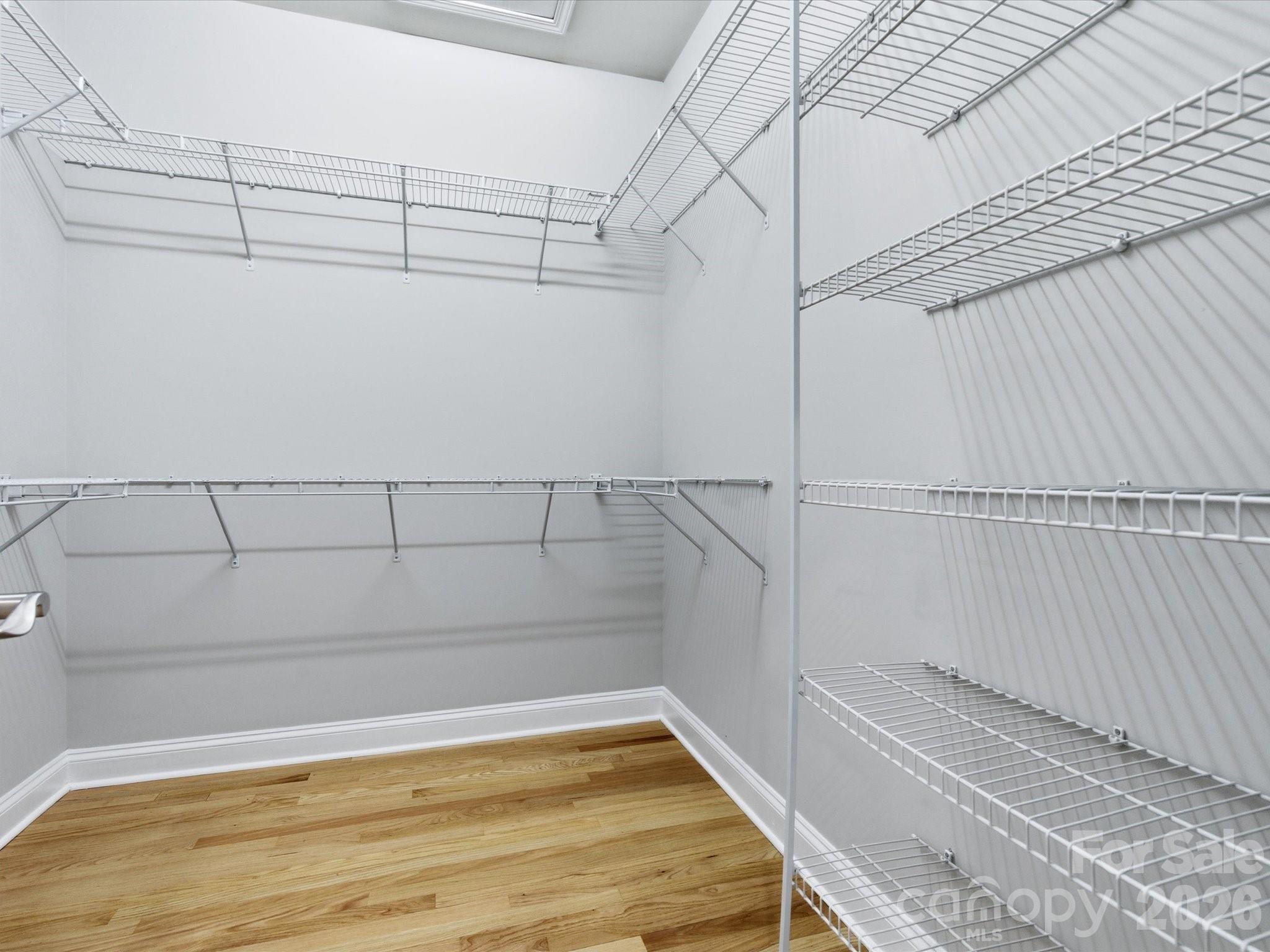 117 Abernathy Road Stanley, NC 28164 - Photo 37 of 47 a view of a room with racks on the wall