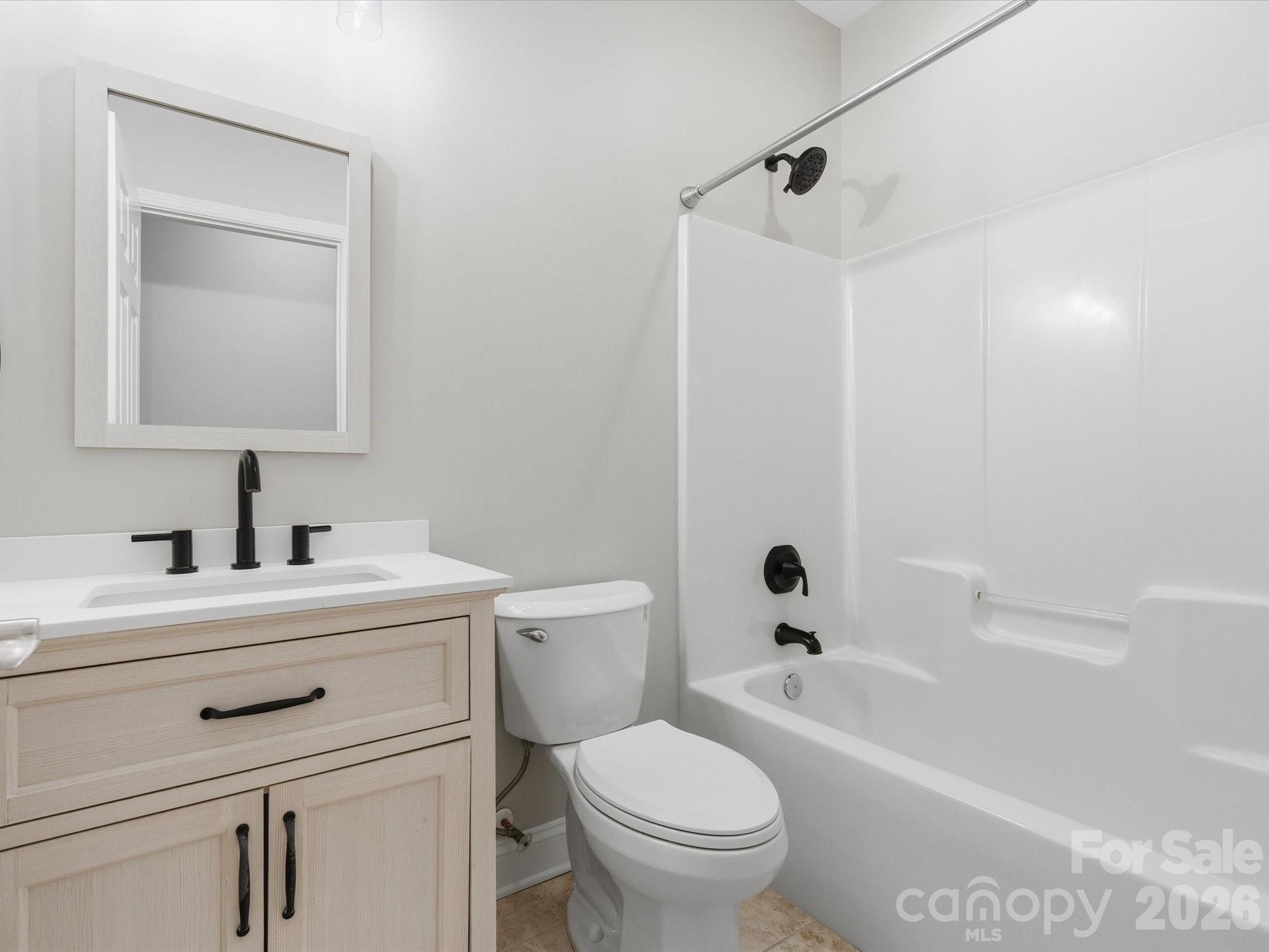 117 Abernathy Road Stanley, NC 28164 - Photo 42 of 47 a bathroom with a sink a toilet and shower