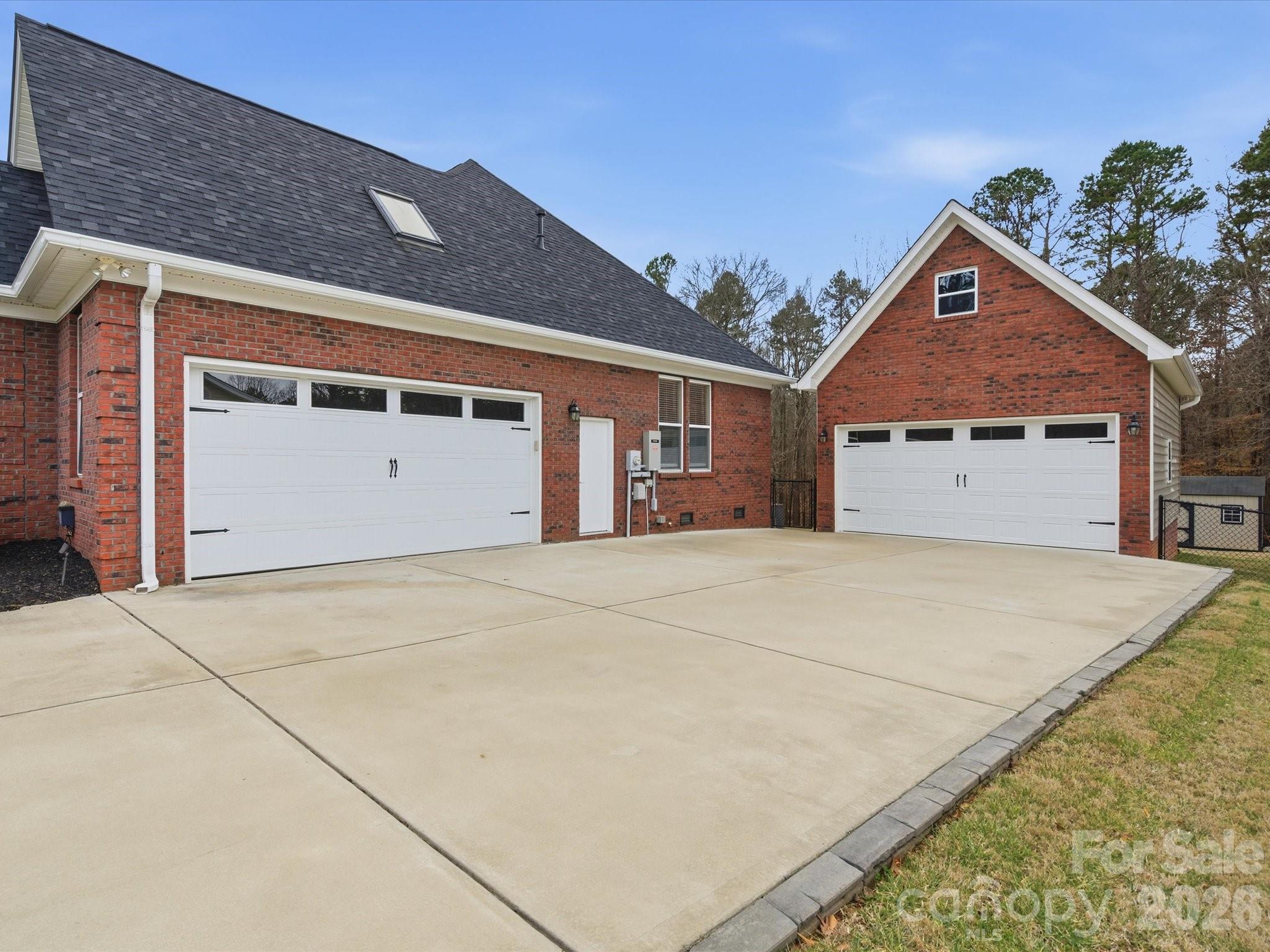 117 Abernathy Road Stanley, NC 28164 - Photo 5 of 47 a front view of a house with a yard and garage