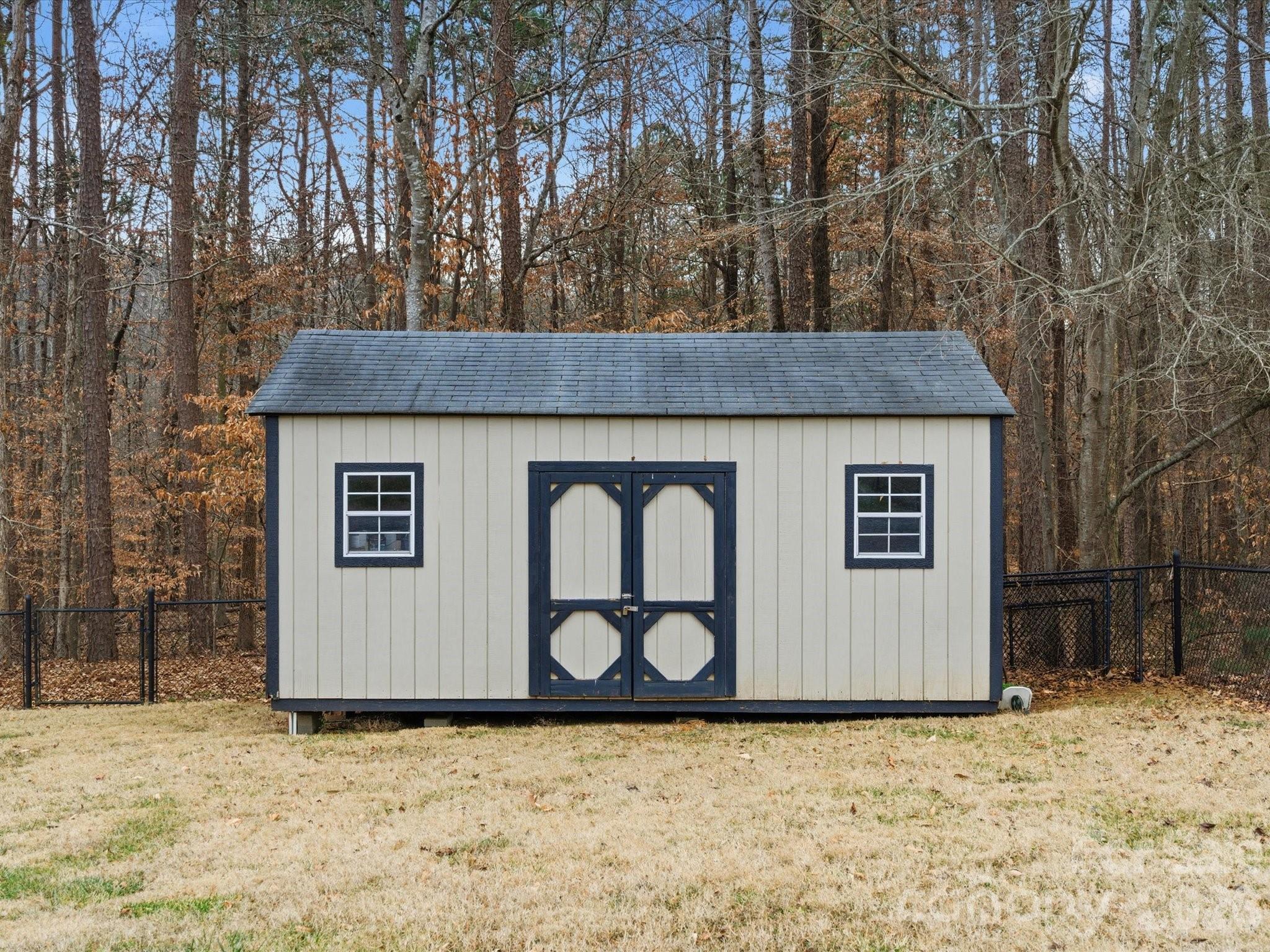 117 Abernathy Road Stanley, NC 28164 - Photo 9 of 47 a house with a tree in the background
